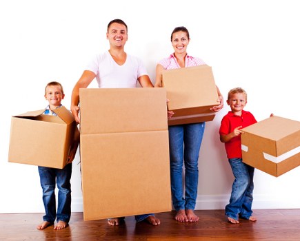 Packed household items prepared for collection by a removals crew