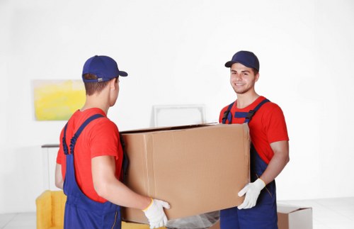 Moving van and packed boxes for a home move in Tulse Hill
