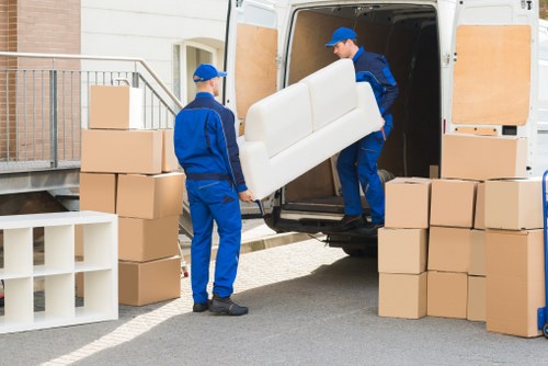 Trained movers handling belongings carefully during a Tulsehill removal