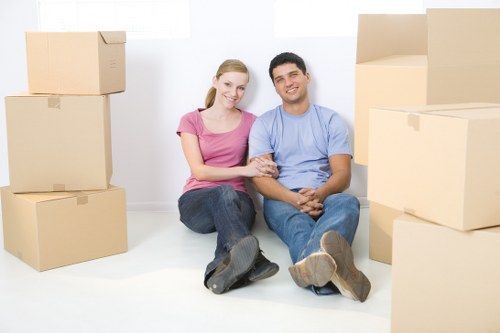 Local house removals service in Tulse Hill with moving van and packed boxes