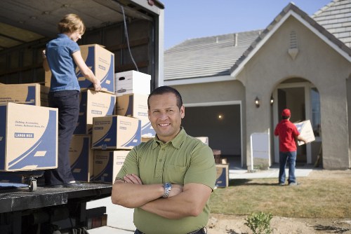 Man with van service loading items for transport