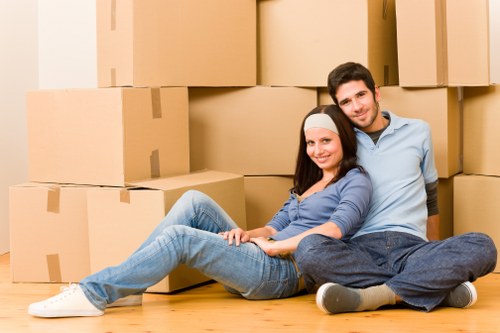Loading household furniture into a removal truck