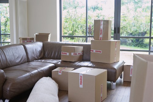 Local moving van helping with loading in South London